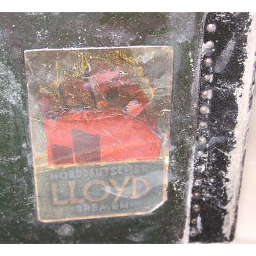 20 - Campaign wardrobe trunk with various travel stickers, approx 60cm x 54cm x 131cm