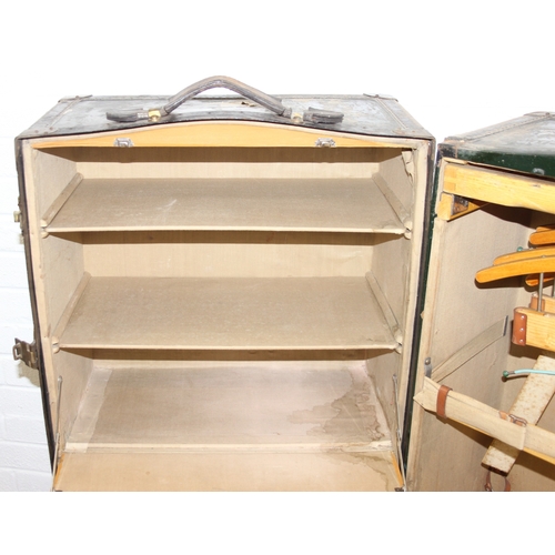 20 - Campaign wardrobe trunk with various travel stickers, approx 60cm x 54cm x 131cm