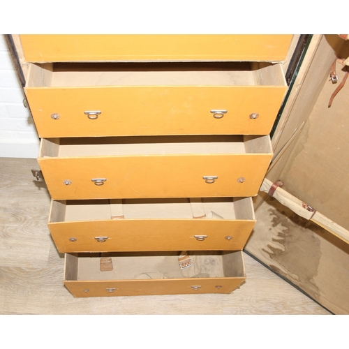 20 - Campaign wardrobe trunk with various travel stickers, approx 60cm x 54cm x 131cm