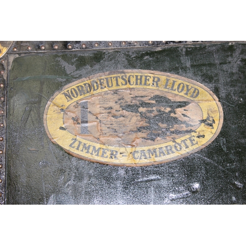 20 - Campaign wardrobe trunk with various travel stickers, approx 60cm x 54cm x 131cm