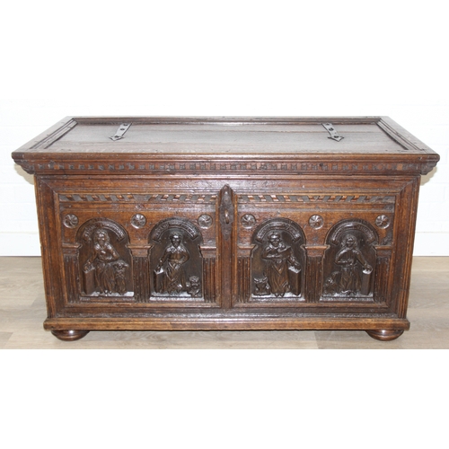 190 - An unusual antique carved oak trunk or coffer depicting the four evangelists or gospels, possibly It... 