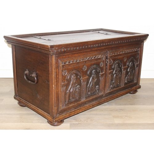 190 - An unusual antique carved oak trunk or coffer depicting the four evangelists or gospels, possibly It... 