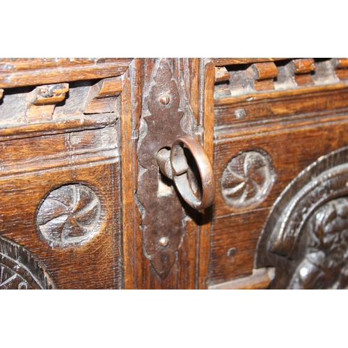 190 - An unusual antique carved oak trunk or coffer depicting the four evangelists or gospels, possibly It... 