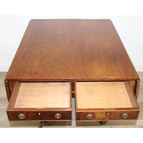 106 - Regency period mahogany drop leaf table with pedestal, splayed base and 4 drawers, 81cm (136cm exten... 