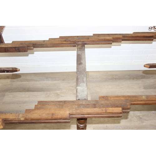 178 - A large extending Oak dining table with reeded supports and drop ends, 113cm x 62cm (raising to 116c... 