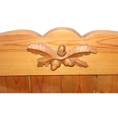 55 - A vintage pine settle or hall seat with storage box seat, carved details, 91cm x 43cm x 109cm
