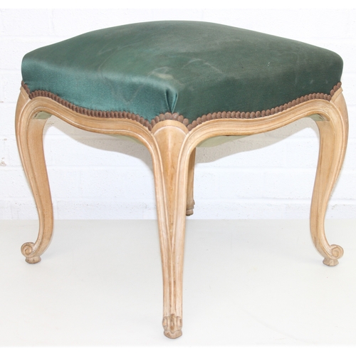 100 - A vintage French style stool with limed wooden legs and green upholstered top, shaped cabriole legs,... 