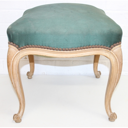 100 - A vintage French style stool with limed wooden legs and green upholstered top, shaped cabriole legs,... 
