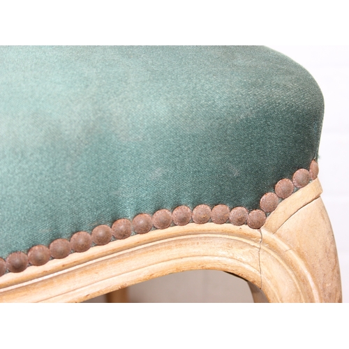100 - A vintage French style stool with limed wooden legs and green upholstered top, shaped cabriole legs,... 