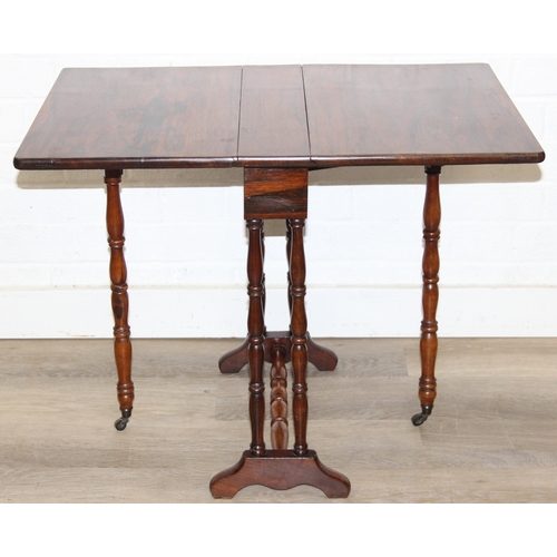 107 - An antique rosewood Sutherland dropleaf table with turned legs, 69cm x 49cm x 53cm when open