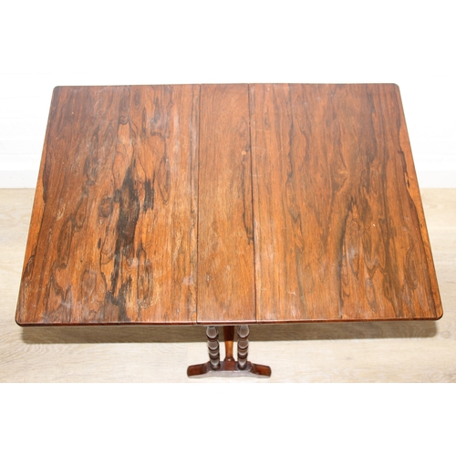 107 - An antique rosewood Sutherland dropleaf table with turned legs, 69cm x 49cm x 53cm when open