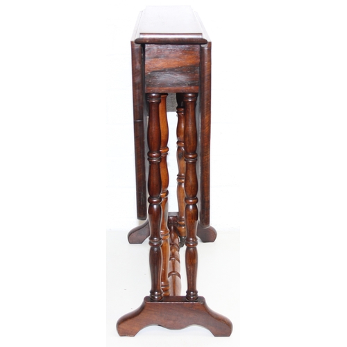 107 - An antique rosewood Sutherland dropleaf table with turned legs, 69cm x 49cm x 53cm when open