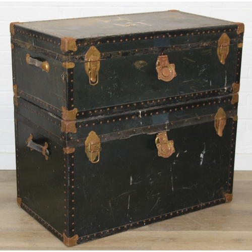 191 - Two large vintage travelling trunks with brass bound corners and studded details, largest 92cm x 52c... 