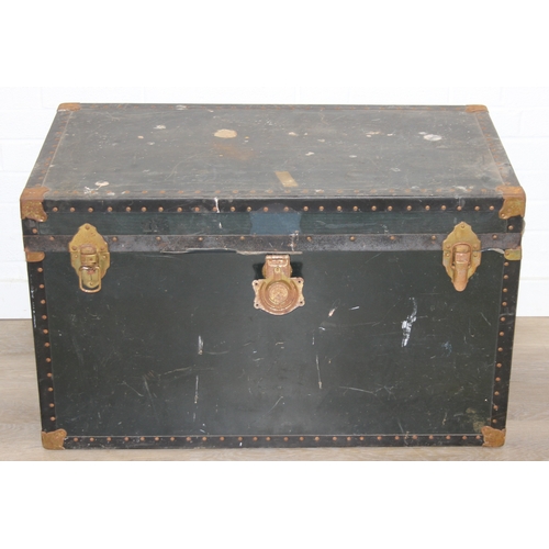 191 - Two large vintage travelling trunks with brass bound corners and studded details, largest 92cm x 52c... 