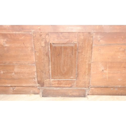 94 - A 19th century mahogany desk with three drawers and two cupboards, approx 120cm x 54cm x 74cm