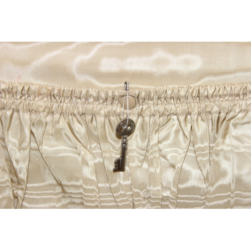 288 - A vintage vellum coloured suitcase by William Parks of Eastbourne, watered silk lined interior, with... 