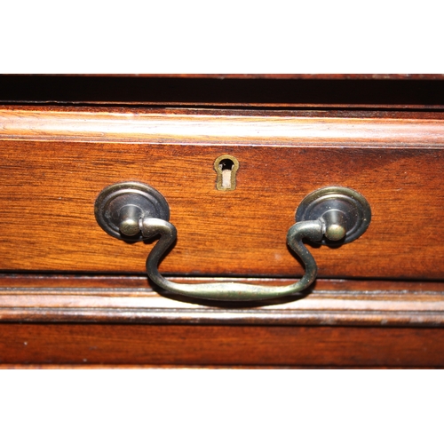 186 - A vintage mahogany partner's three-part pedestal desk with inset green leather top, eighteen drawers... 