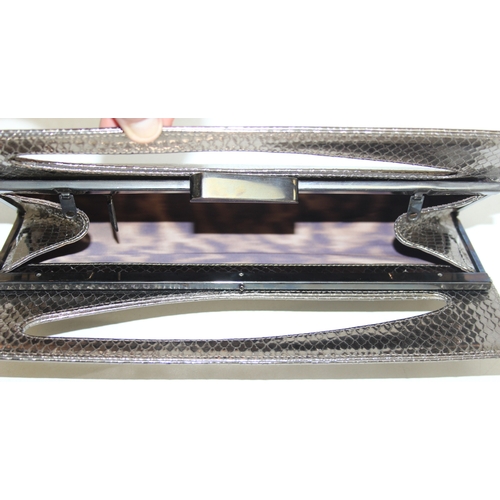 217 - Stuart Weitzman ladies' evening snap-shut clutch bag in metallic snakeskin style finish, 30cm W