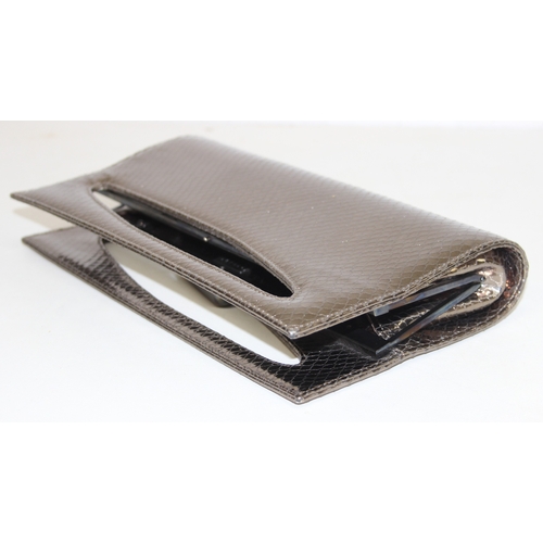 217 - Stuart Weitzman ladies' evening snap-shut clutch bag in metallic snakeskin style finish, 30cm W