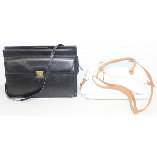 218 - 2 vintage leather bags to incl a black satchel style/briefcase hand bag and a cream and beige larges... 