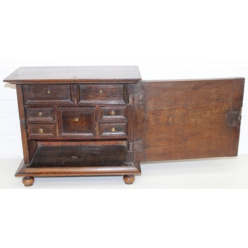 289 - An antique oak and walnut with sycamore banding spice cupboard, in part Queen Anne period c.1700 wit... 