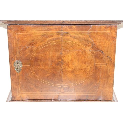 289 - An antique oak and walnut with sycamore banding spice cupboard, in part Queen Anne period c.1700 wit... 