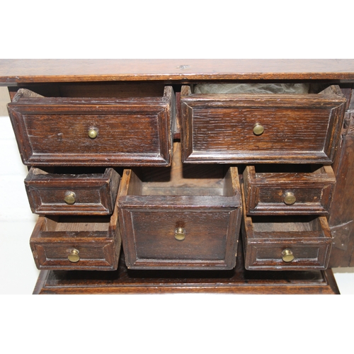 289 - An antique oak and walnut with sycamore banding spice cupboard, in part Queen Anne period c.1700 wit... 
