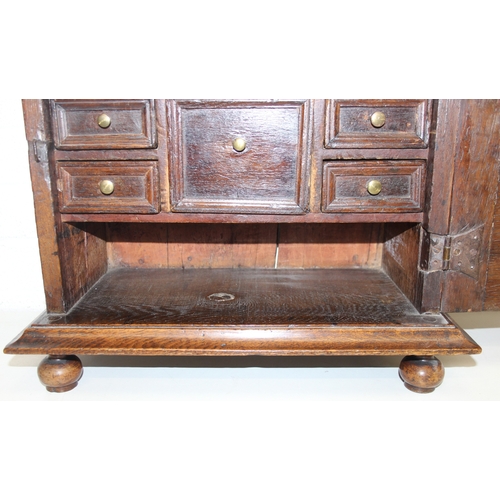 289 - An antique oak and walnut with sycamore banding spice cupboard, in part Queen Anne period c.1700 wit... 