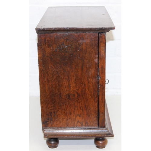 289 - An antique oak and walnut with sycamore banding spice cupboard, in part Queen Anne period c.1700 wit... 