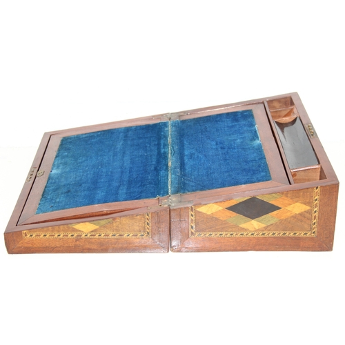 292 - A Victorian parquetry wooden writing slope with geometric marquetry inlaid details, blue velvet lini... 