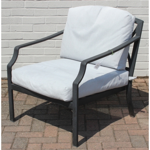 314 - A modern aluminium garden set comprising of a two seater sofa and a chair with cushions, and a small... 