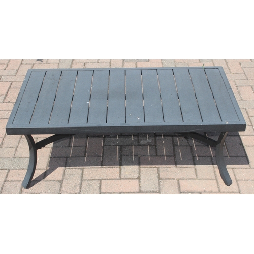 314 - A modern aluminium garden set comprising of a two seater sofa and a chair with cushions, and a small... 