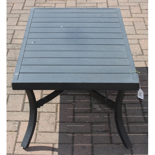 314 - A modern aluminium garden set comprising of a two seater sofa and a chair with cushions, and a small... 