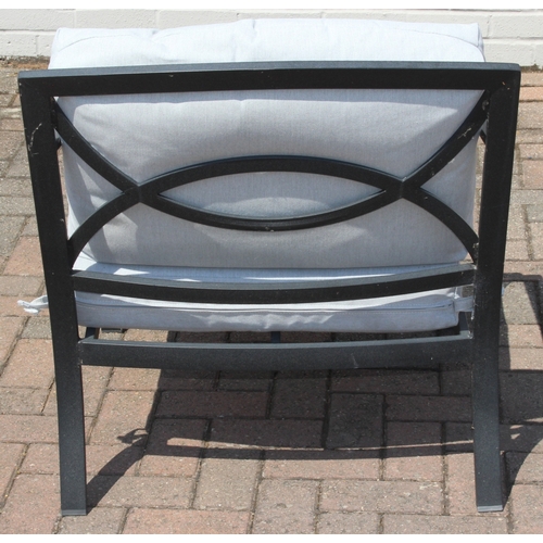 314 - A modern aluminium garden set comprising of a two seater sofa and a chair with cushions, and a small... 