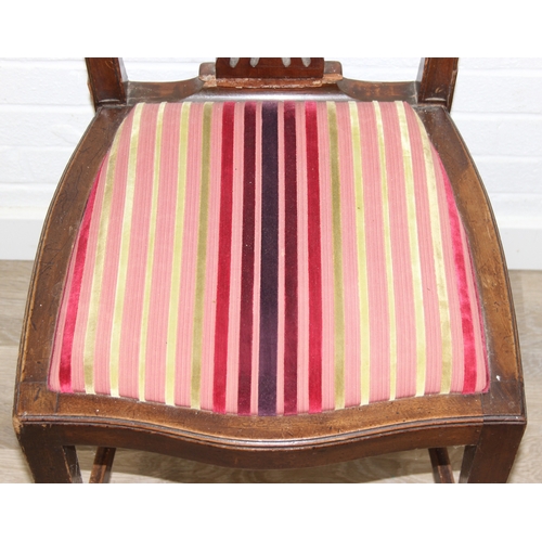 60 - A set of six Hepplewhite style dining chairs with harlequin-coloured seats, likely early 20th centur... 