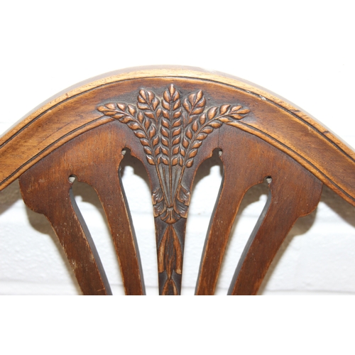 60 - A set of six Hepplewhite style dining chairs with harlequin-coloured seats, likely early 20th centur... 