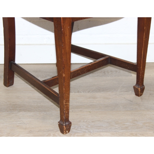 60 - A set of six Hepplewhite style dining chairs with harlequin-coloured seats, likely early 20th centur... 