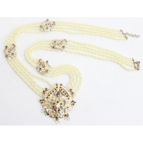 A highly decorative silver gilt seed pearl necklace set with white and ...