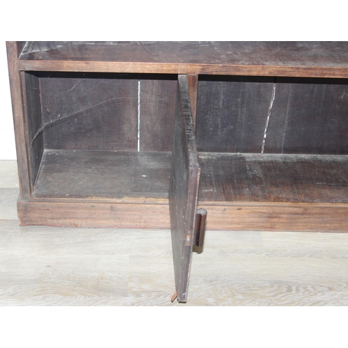 10 - A large two-piece bookcase or display shelves with glazed cupboard, early-mid 20th century, 296cm x ... 