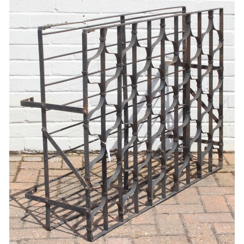 323 - Vintage wrought iron wall mountable 80 bottle wine rack, 103cm x 35cm x 75cm