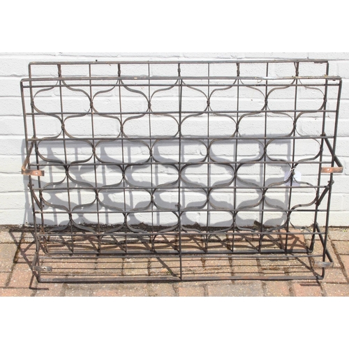 323 - Vintage wrought iron wall mountable 80 bottle wine rack, 103cm x 35cm x 75cm