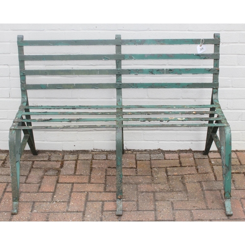 324 - Antique green painted wrought iron garden bench with scroll end detail, late 19th or early 20th cent... 