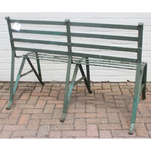 324 - Antique green painted wrought iron garden bench with scroll end detail, late 19th or early 20th cent... 