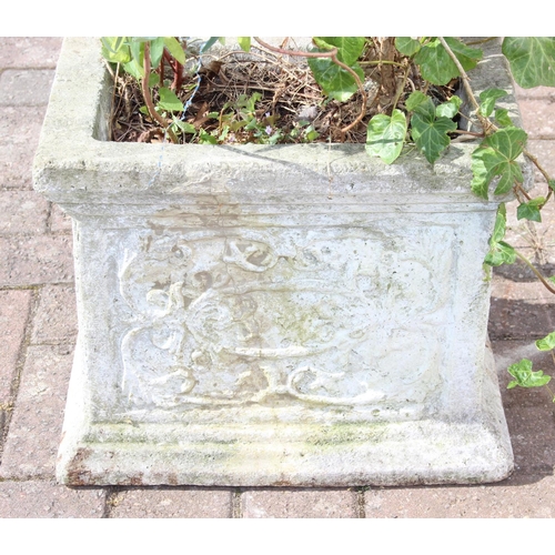 305 - A weathered garden planter with plants, the planter alone 37cm x 25cm x 30cm