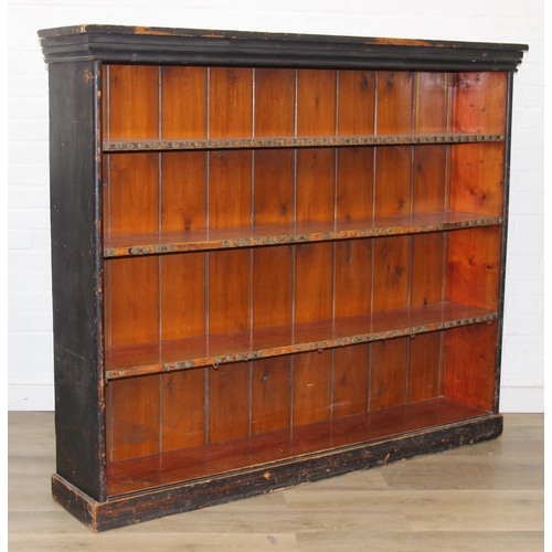 92 - An antique black painted pine bookcase with decorative roundels to shelf, approx 161cm x 30cm x 134c... 