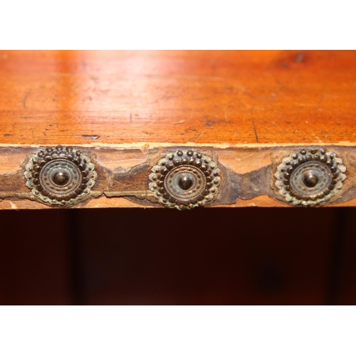 92 - An antique black painted pine bookcase with decorative roundels to shelf, approx 161cm x 30cm x 134c... 