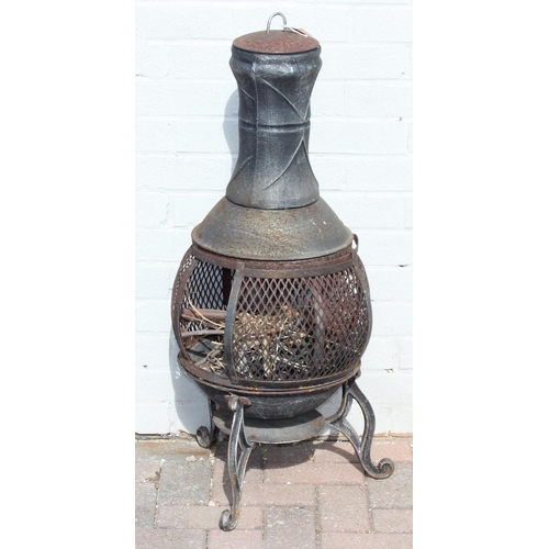 317 - A vintage metal chimenea or garden brazier, 90cm tall