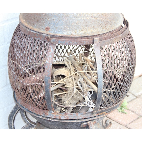 317 - A vintage metal chimenea or garden brazier, 90cm tall