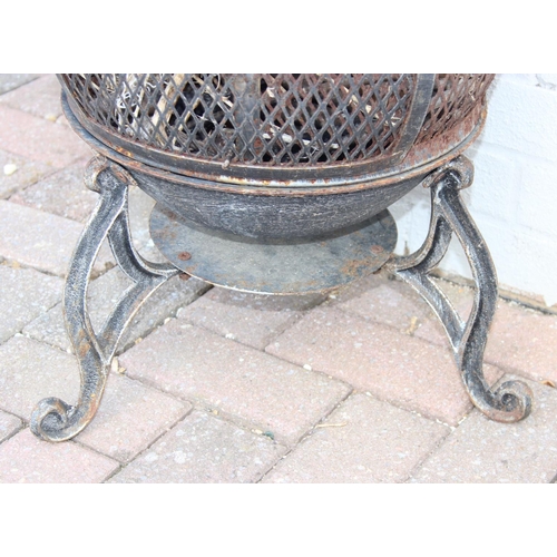 317 - A vintage metal chimenea or garden brazier, 90cm tall