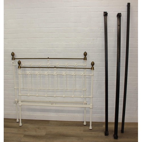 115 - A vintage white painted cast iron and brass small double bed frame, likely late Victorian, 122cm x 2... 